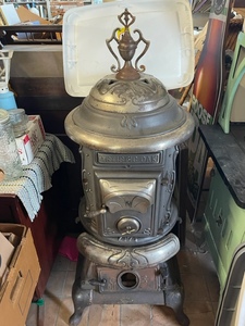 lot 20 image: Artistic Oak Cast Iron Potbelly Stove