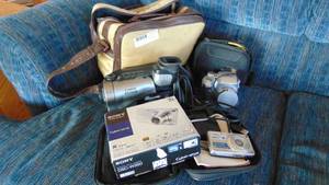 2 Cameras and 1 Video Camera with Misc