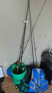 7 Fishing Rods, 2 Reels and 2 Life Jackets