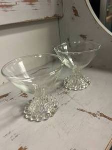 pair of footed glasses