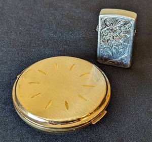 lot 134 image: Vintage Lighter and Stratton Gold Tone Compact