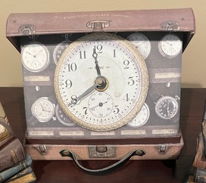 lot 78 image: Two Book Themed Bookends and Thomas Williams and Sons Clock