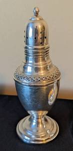 lot 40 image: Weighted Sterling Silver Candleholder and Salt and Pepper Shakers