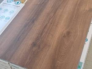 lot 277 image: Lot of (24 Boxes) Pergo Defense Rare Penny Oak Flooring 7-count Total Coverage 418-sq.ft.