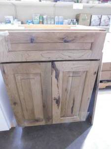 lot 128 image: Rustic Hickory Plywood Shaker Stock Assembled Bath Kitchen Cabinet 24 in. x 34.5 in. x 21 in.