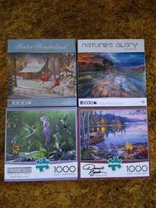 lot 36 image: (4) 1,000 Piece Puzzles