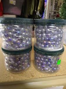 lot 123 image: Four Jars Glass Marbles