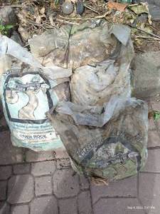 lot 306 image: Four Bags River Rock,  Each 12Cu Ft
