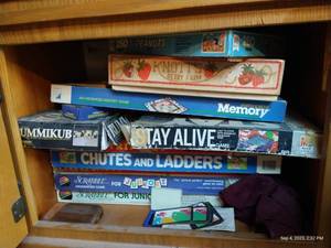 lot 300 image: Game Cabinet, Left Side Vntg Childrens Puzzle, Chutes & Ladders, Stay Alive, Etc.