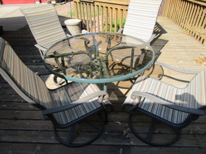 lot 13 image: Patio table 48, four platform swiv...