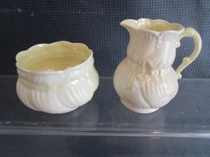 lot 34 image: Belleek cream & sugar...