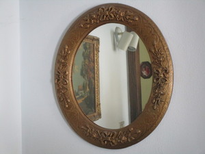 lot 37 image: Antique mirror, ornate oval frame...
