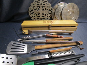 lot 127 image: BBQ tools, pigtail set, trivet, bur...