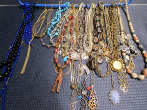 lot 141 image: Costume jewelry 48 necklaces...