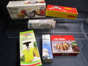 lot 169 image: Kitchen gadgets Potato ricer, pine...