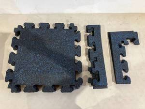 lot 279 image: TrafficMaster Rubber Gym Floor Tiles - Black with Blue Flecks