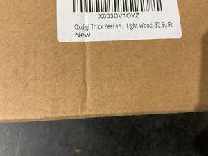 lot 657 image: Oxdigi Roll of Peel and Stick Vinyl Flooring in Light Wood