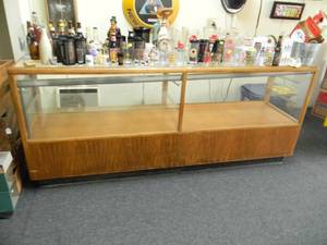 DISPLAY CABINET WITH STORAGE IN BOTTOM - CAN BE LIGHTED - APPROX 90long - 39high - 22deep - SOLID PIECE - BRING HELP TO REMOVE