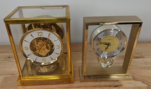 lot 86 image: Vintage Jaeger LeCoultre Atmos Mantel Clock and Howard Miller Gold Brass Glass Mantel Clock D