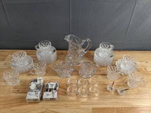 lot 78 image: Gorgeous Set of Crystal Colored Entertaining Dishware with Silver Colored Silverware   D