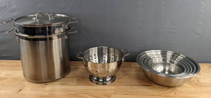 lot 93 image: Stainless Colored Mixing Bowls, Steaming Pot and Colander  D