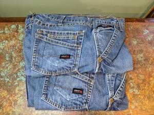 lot 480 image: Two Pair Mens Ariat Jeans P