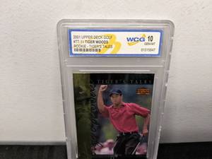 lot 46A image: WCG Graded 10 Tiger Woods 2001 Upper Deck Golf Rookie Tigers Tales Card #TT11 V