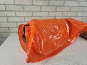 lot 115 image: Large Roll of Orange Leaf Bags - Continuous Roll, Just tie the bottom and fill - Make them as long as you want