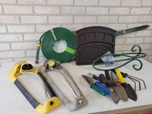 lot 182 image: Lot of Gardening Supplies - Suncast Hose Bracket, Soaker Hose, Garden Tools, Sprinklers and More - NO SHIPPING