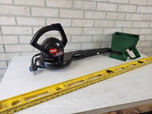 lot 199 image: TORO Electric Blower (Works), 48 Level and Hand Spreader - NO SHIPPING