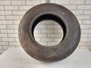 lot 265 image: 21570R15 Tire - Good Tread - NO SHIPPING