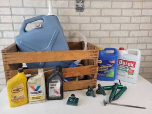 lot 400 image: Reliance 6-Gallon Water Jug, Oil (Partials), Anti-Freeze (Partials), Solar Mole Repeller, Funnel and More - NO SHIPPING