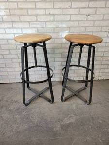 lot 533 image: Pair of Swiveling Wood and Iron Bar Stools - NO SHIPPING