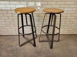 lot 534 image: Pair of Swiveling Wood and Iron Bar Stools - NO SHIPPING