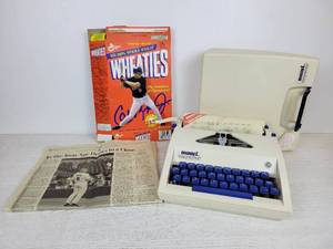 lot 543 image: Vintage BuddyL Easy Writer Childrens Typewriter and Cal Ripken, Jr. Wheaties Box with Article on his Retirement from the Minneapolis StarTribune