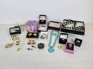 lot 601 image: Lot of Jewelry - Necklaces, Rings, Earrings, Brooches, Bracelets - Includes Sterling Silver, Semi-Precious Stones, and More