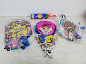 lot 627 image: Lot of Mylar Balloons - Minis, Smalls, and Troll-Shaped Ones Includes Balloon Pump