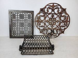 lot 677 image: Lot of Cast Iron Pieces - Sewing Machine Treadle, Heat Register Cover, and Large Decorative Medallion - NO SHIPPING