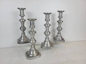 lot 679 image: Lot of (4) Cast Aluminum Candle Sticks