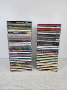 lot 701 image: Lot of 50 CDs - The Eagles, George Harrison, Fleetwood Mac, Clint Black, Wilson Phillips, Travis Tritt, and More