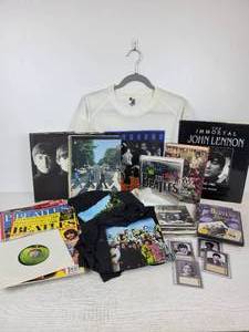 lot 708 image: Lot of Beatles Memorabilia - T-shirts, Magazines, Books, DVDs and More