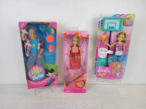 lot 726 image: Set of (3) Dolls - 1993 Camp Barbie KEN, 2008 Valentine Glam Barbie, and 2019 Barbie Dreamhouse Adventures Stacie