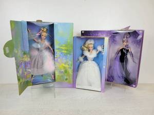 lot 735 image: Set of (3) Barbie Dolls - 2000 Ballet Masquerade Barbie, 2002 Winters Reflection Barbie, and 2001 Sterling Silver Rose Barbie by Bob Mackie for AVON