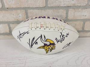 lot 571 image: Minnesota Viking Autographed Football - Has (8) Signatures - we could only determine the following players - #22 Harrison Smith, #75 Matt Kalil, #63 Brandon Lusco and #29 Xavier Rhodes - No Certificate, but they look like hand written and not printed on
