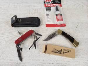 lot 662 image: Swiss Army Knife, 3 Folding Pheasants Forever Knife and J-B Super Weld Glue