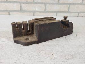 lot 667 image: Antique Queen Sickle Bar Anvil and Chain Breaker