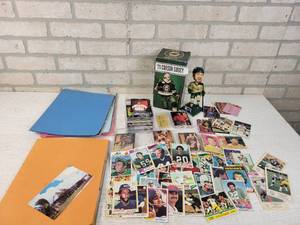 lot 818 image: Lot of 1970s Baseball, Football and Basketball Cards, Carson Soucy Bobblehead, Container of 2007 Topps Baseball Cards, 1993 Action Packed Hall of fame Basketball Cards, 1986 Fleer baseball Cards, 1990 Topps Baseball cards,