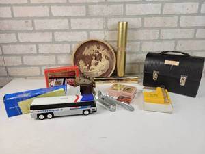 lot 853 image: Greyhound Bus Coin Bank, Incolay Studios Sculptured Plate, Playing Cards, Vintage Lunchbox and More - NO SHIPPING