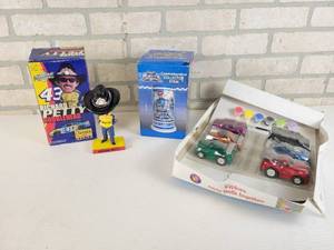 lot 745 image: Richard Petty Bobblehead, Rustys Last Call Beer Stein and Toy Cars