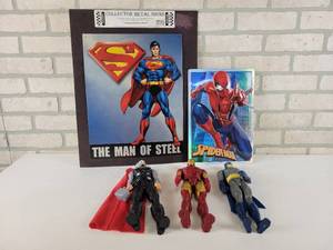 lot 746 image: (2) Superhero Tin Signs and (3) 12 Action Figures